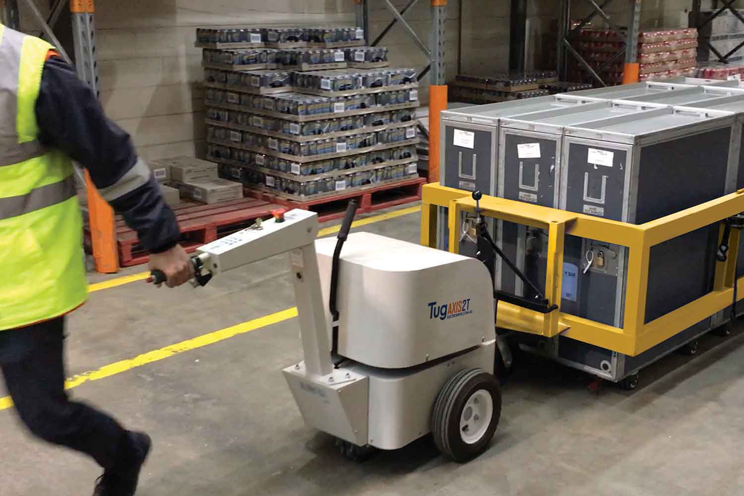 Electrodrive's Tug Axis moving an airline cart 